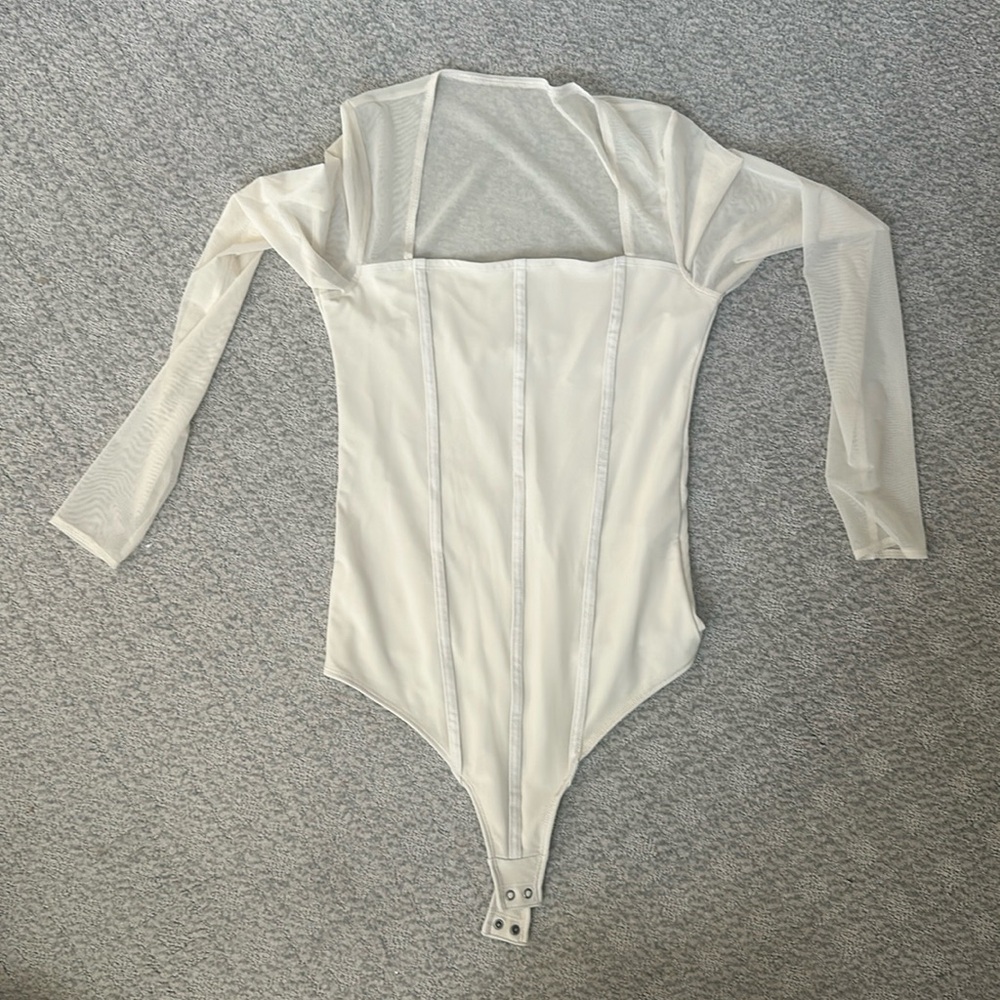 Sheer sleeved bodysuit